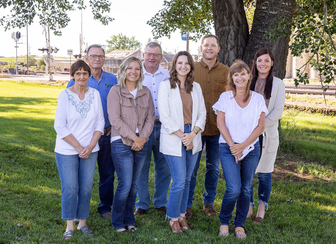 About Our Agency - The Agency Insurance LLC Team Standing Together